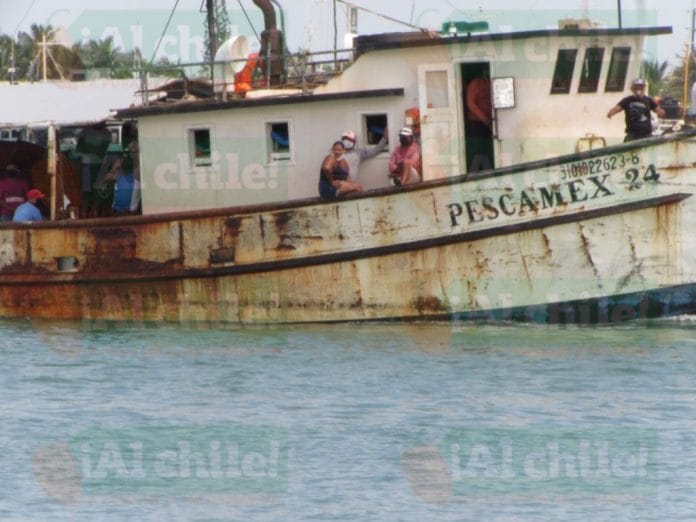 Arriba barco con un pescador muerto en Progreso